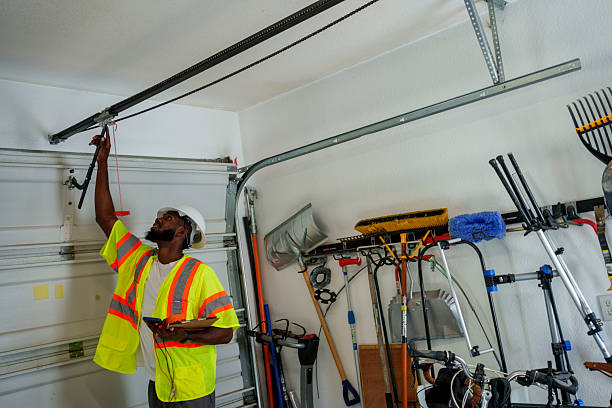 Professional Garage Door Roller Replacement technician working in Trail Creek, IN
